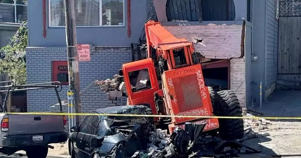 Front-loader wrecks cars, smashes into house in San Francisco construction mishap