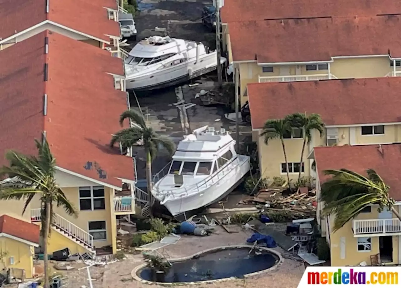 Foto : Penampakan Kapal-Kapal di Florida Terdampar Akibat Badai Ian | merdeka.com