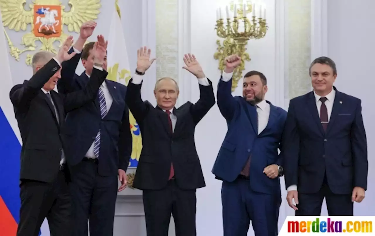 Foto : Wajah Putin Semringah usai Caplok 4 Wilayah Ukraina | merdeka.com