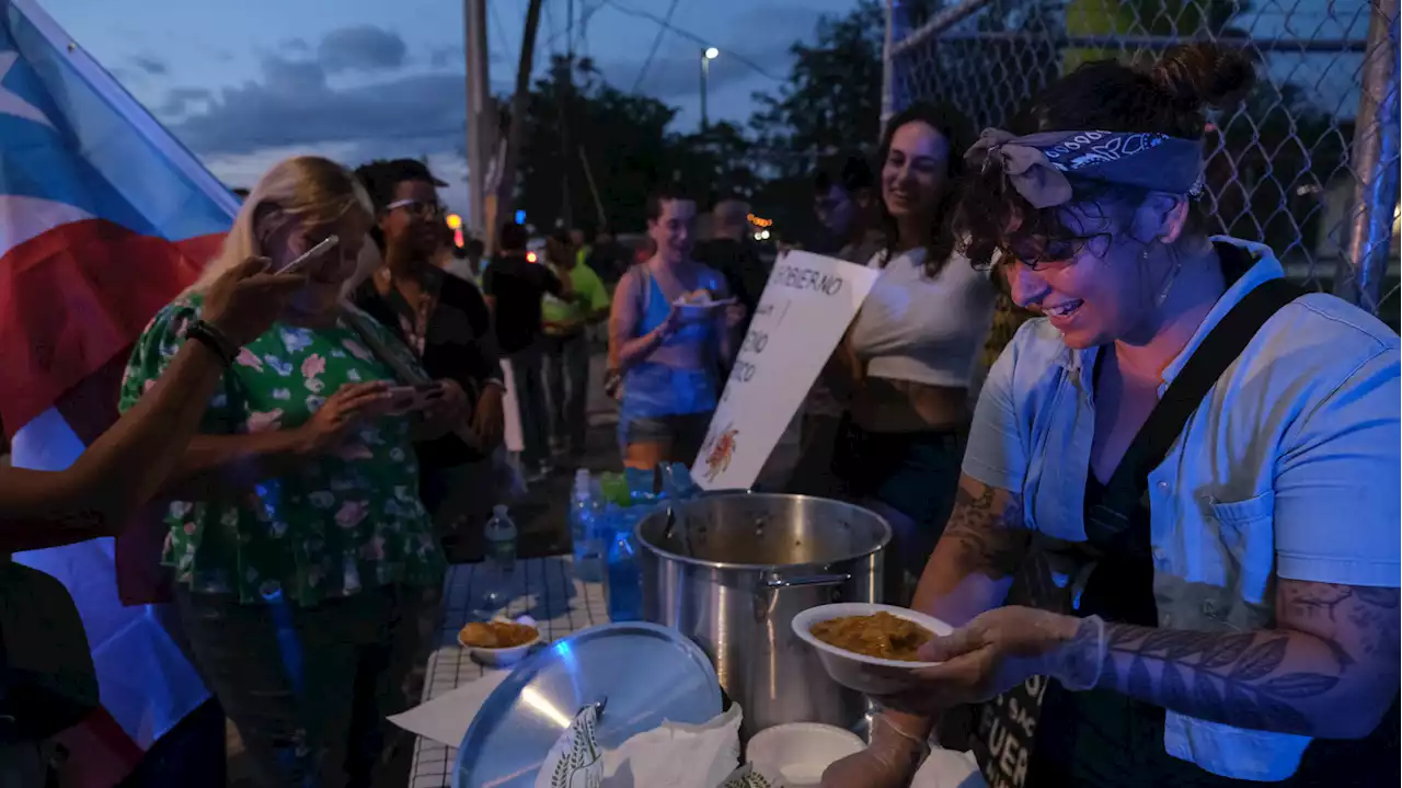 As hurricanes put Puerto Rico's government to the test, neighbors keep each other fed