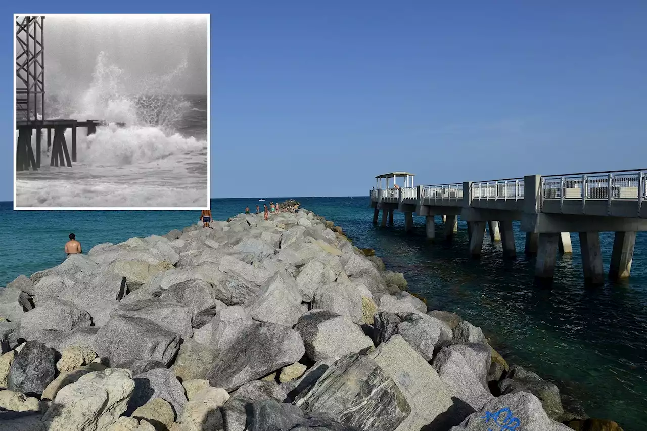 Six injured after monster wave slams Miami Beach boardwalk