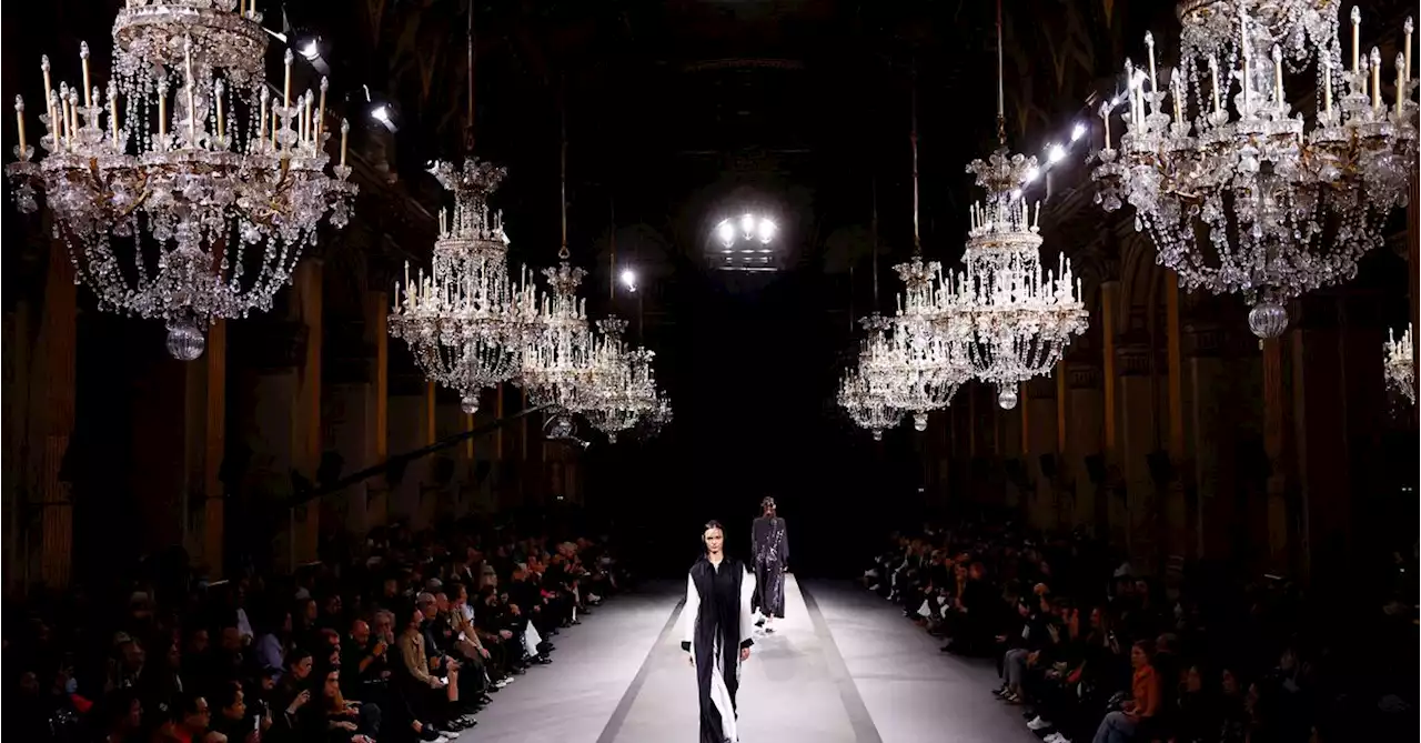 Under a cloud of belt-tightening, Paris Fashion Week struts on