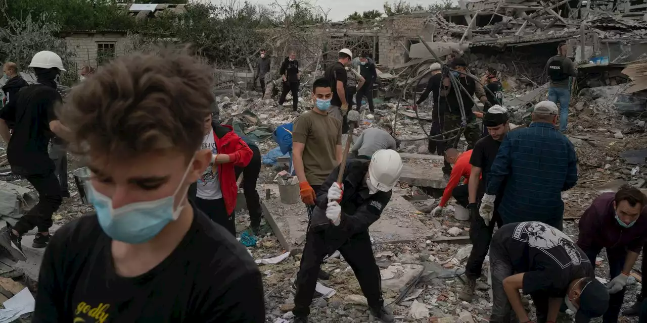 Explosions rock central Kyiv in apparent missile strikes, with reports of death, injuries