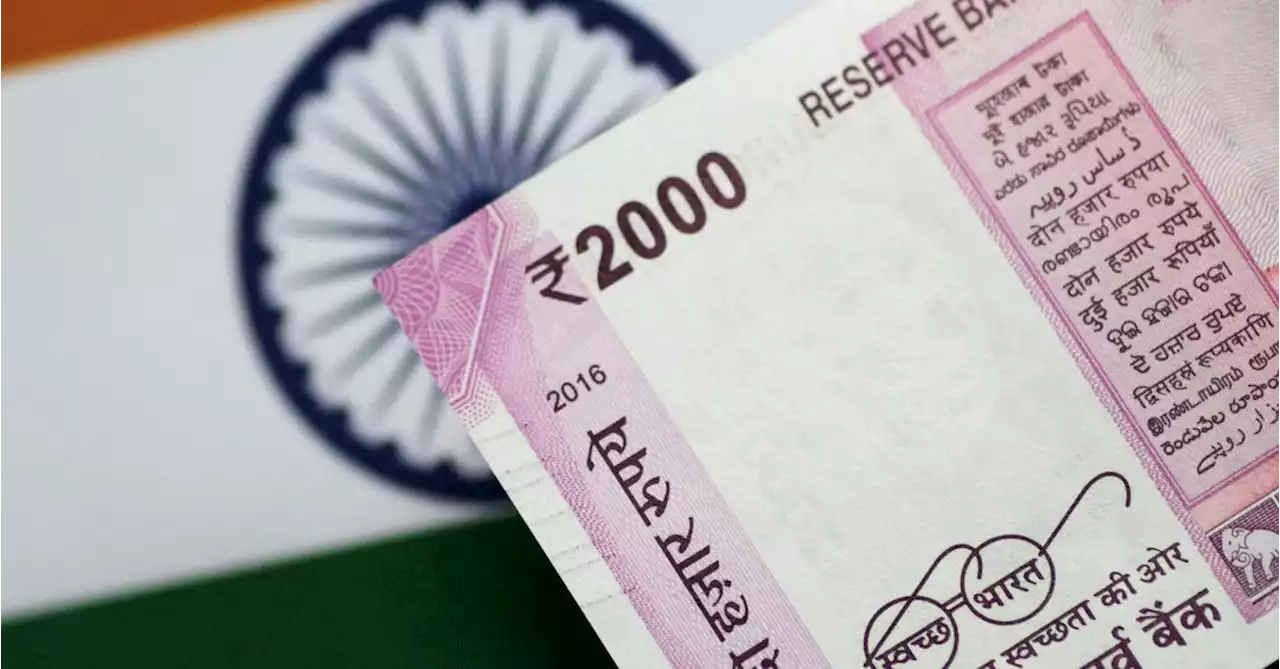 Rupee recovers from record low on RBI support