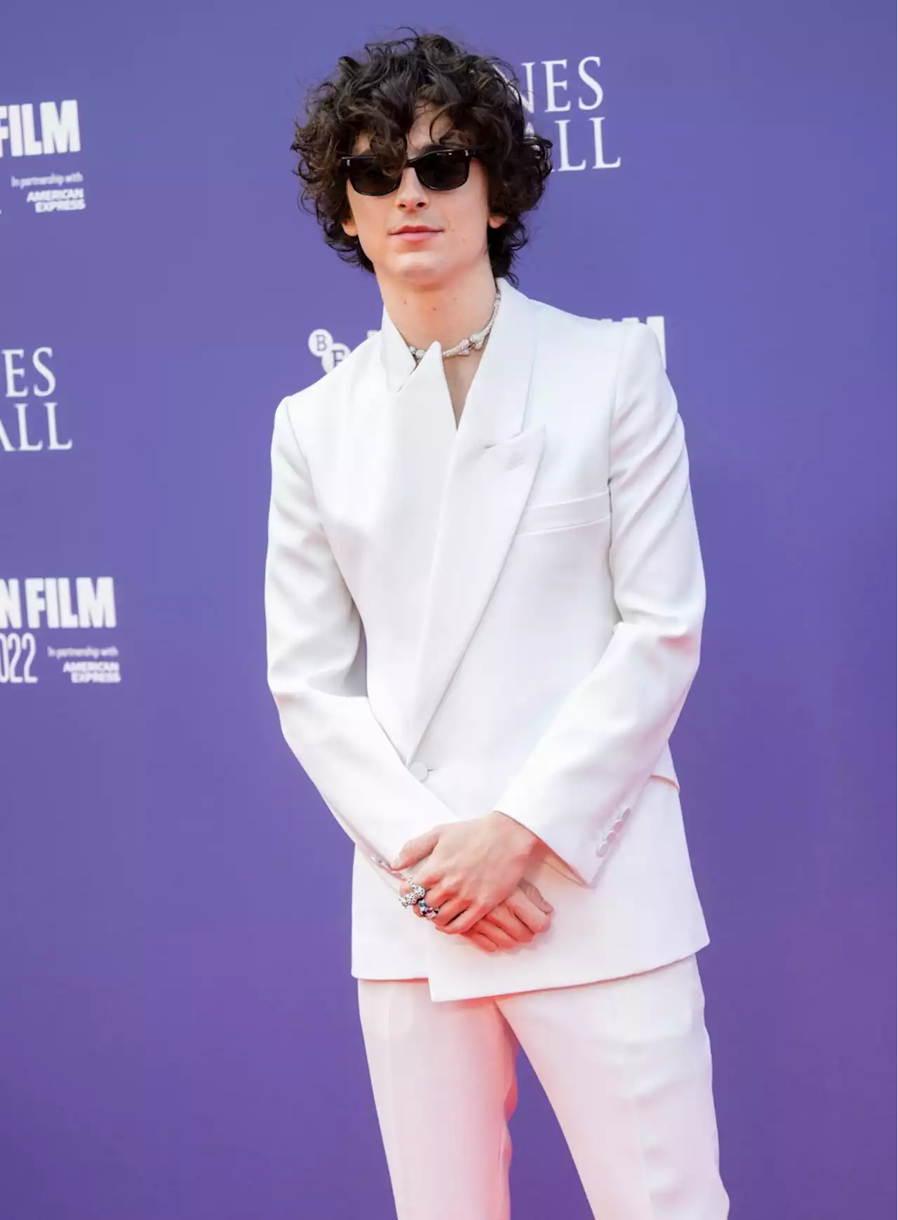 Timothée Chalamet Does Monochromatic Dressing in White Alexander McQueen Suit and Boots for ‘Bones and All’ Premiere