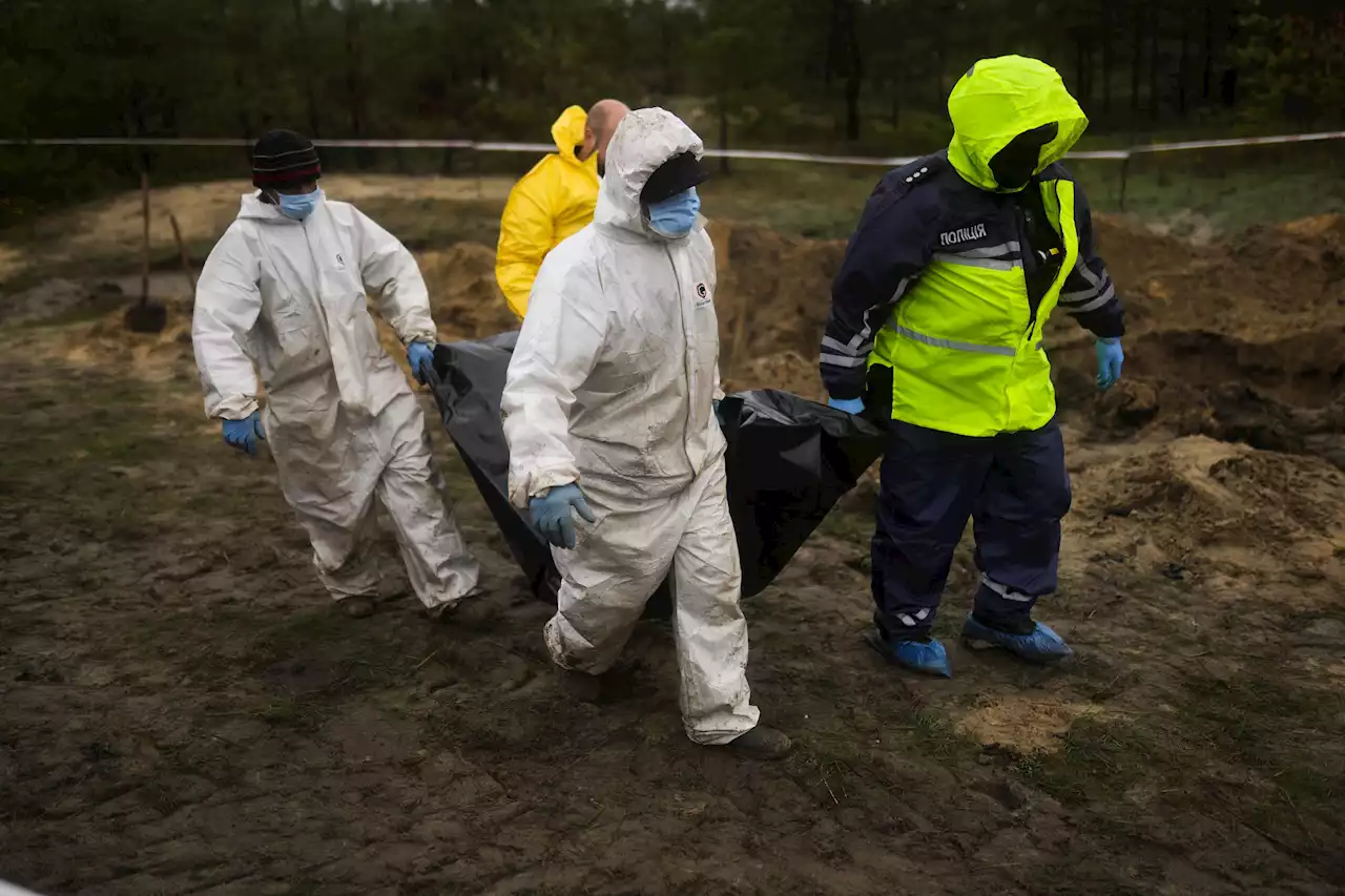 Bodies exhumed from mass grave in Ukraine's liberated Lyman