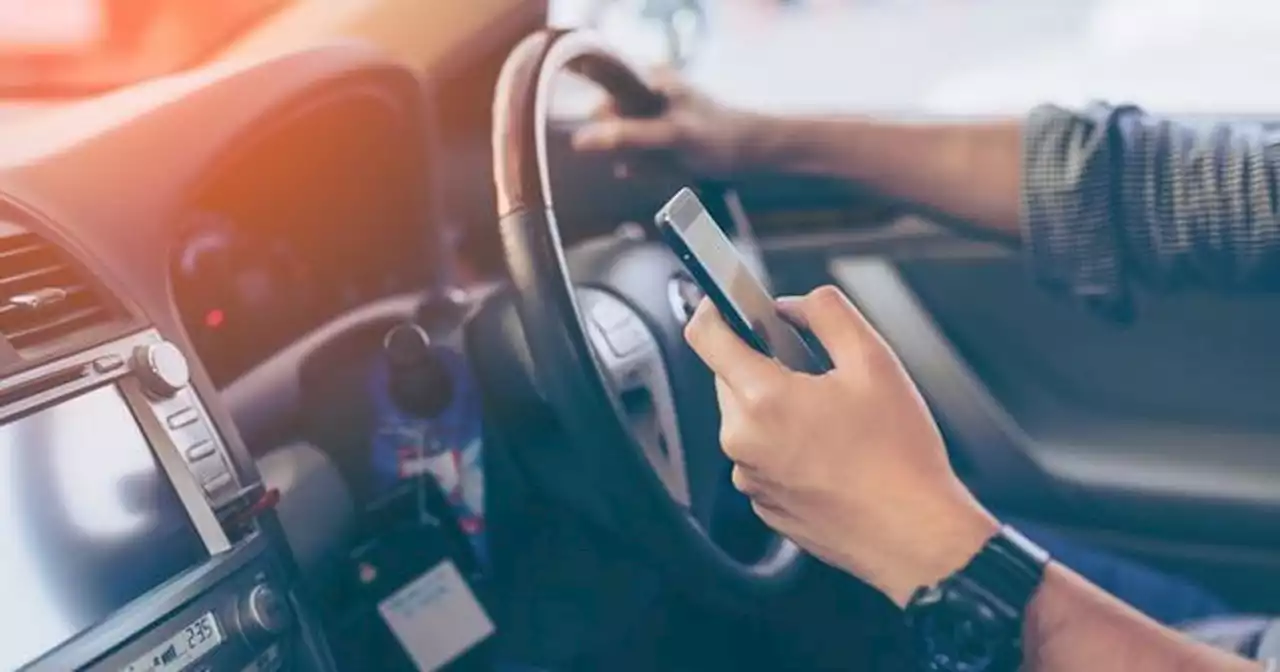 Highway Code allows you to use phone in car in two circumstances