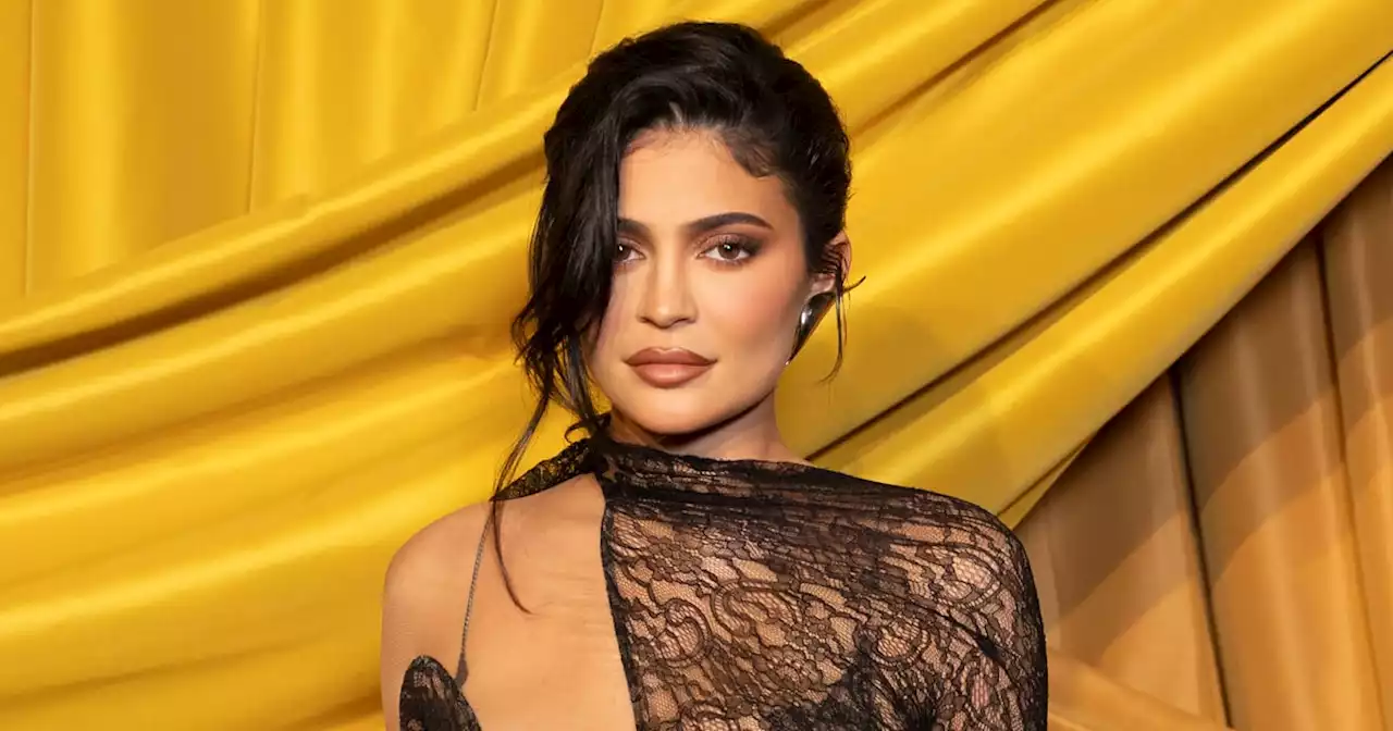 Kylie Jenner Channels Batman in a Plunging Jumpsuit and a Corset With Fake Abs