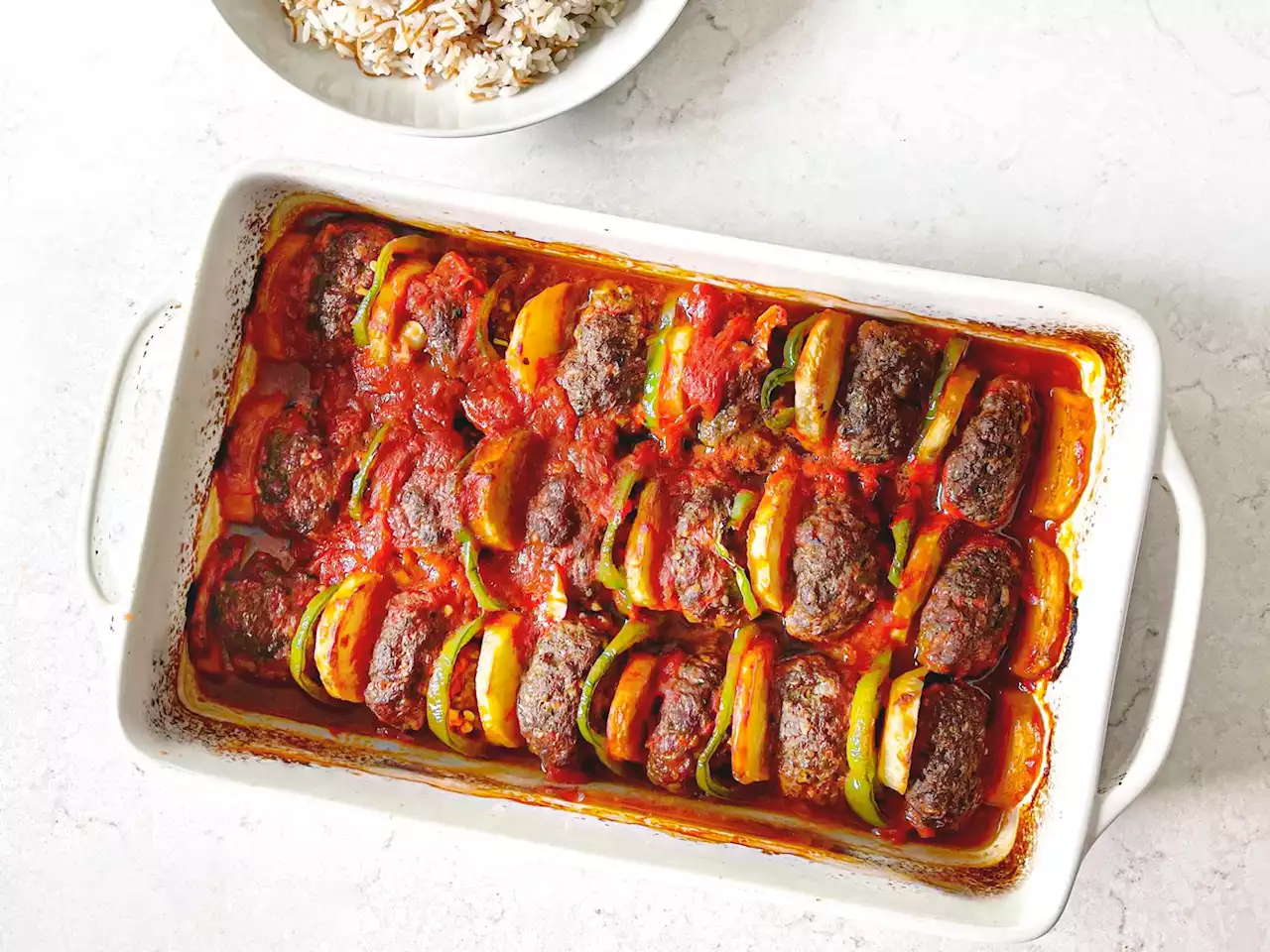 Kafta bi Bandora (Palestinian Ground Meat Patties in Tomato Sauce)