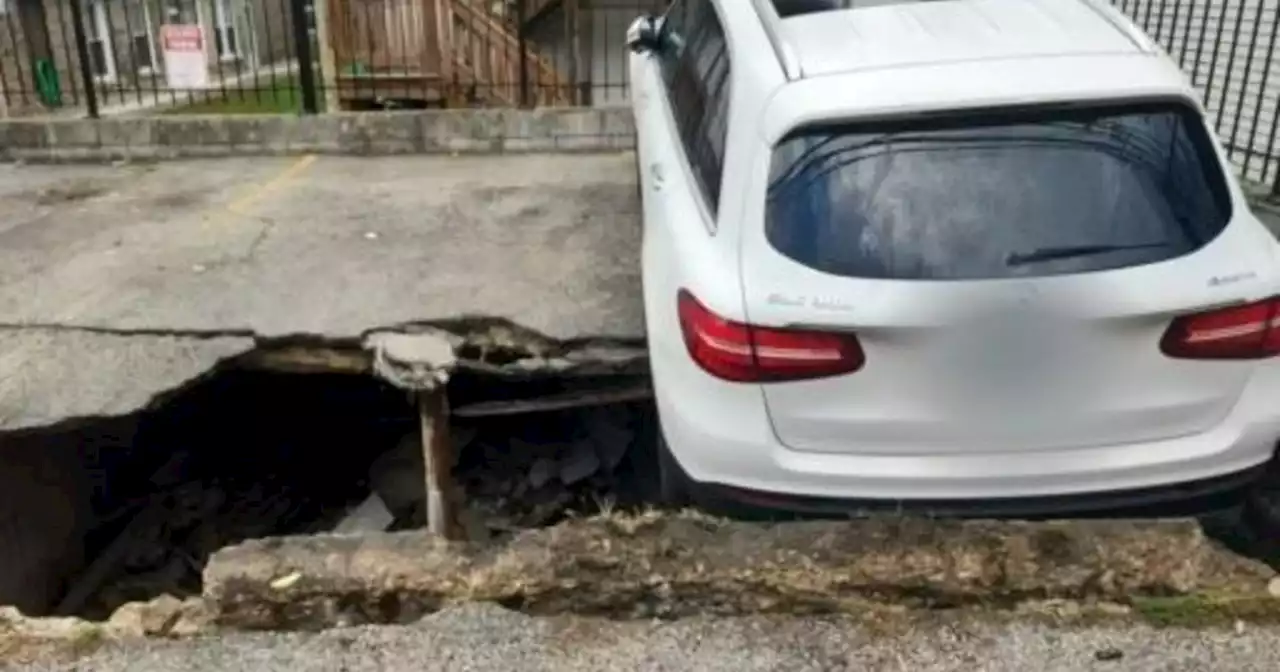 'Just mesmerized by it': Giant sinkhole in Lincoln Park has neighbors on edge