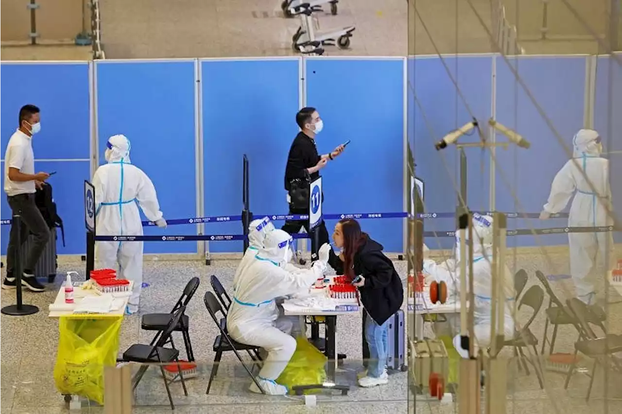 Shanghai Covid-19 cases hit three-month high as officials try to contain the virus