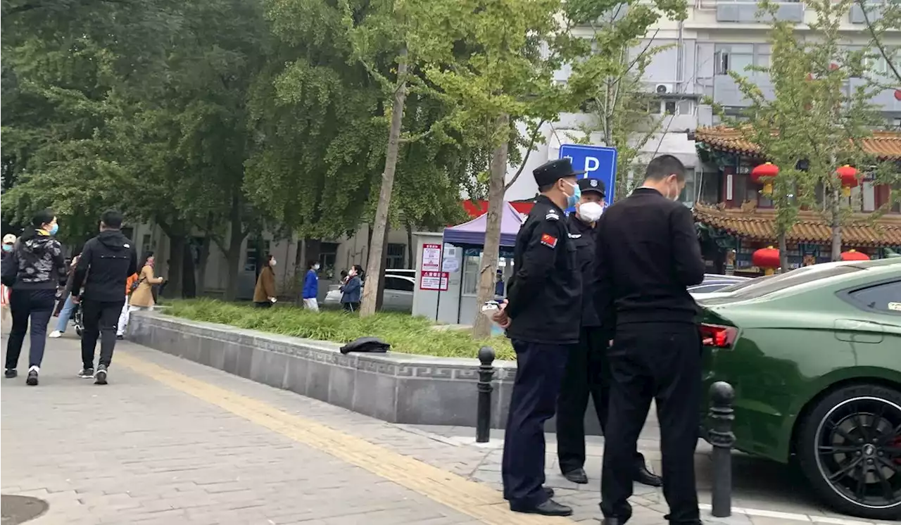 Beijing police mobilize as rare public protest mars preparations for Xi-dominated party congress