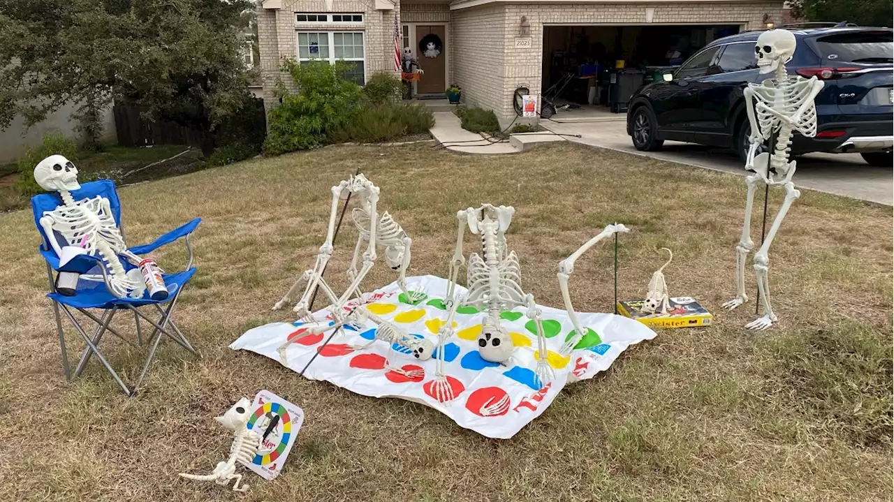 Family Changes Skeleton Halloween Display Every Day in October