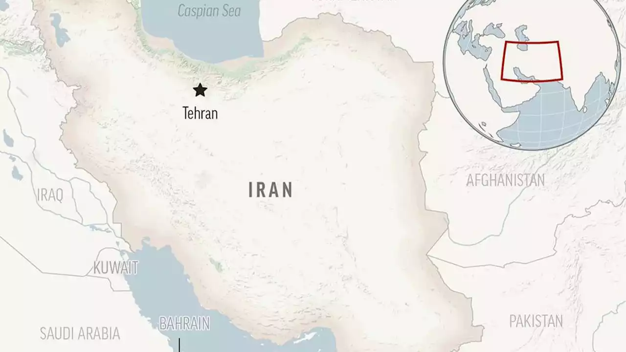 Blaze, shots heard from prison in Iran capital amid protests