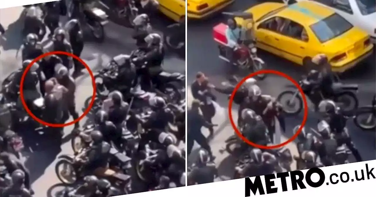 Riot police caught sexually assaulting female protester in Iran