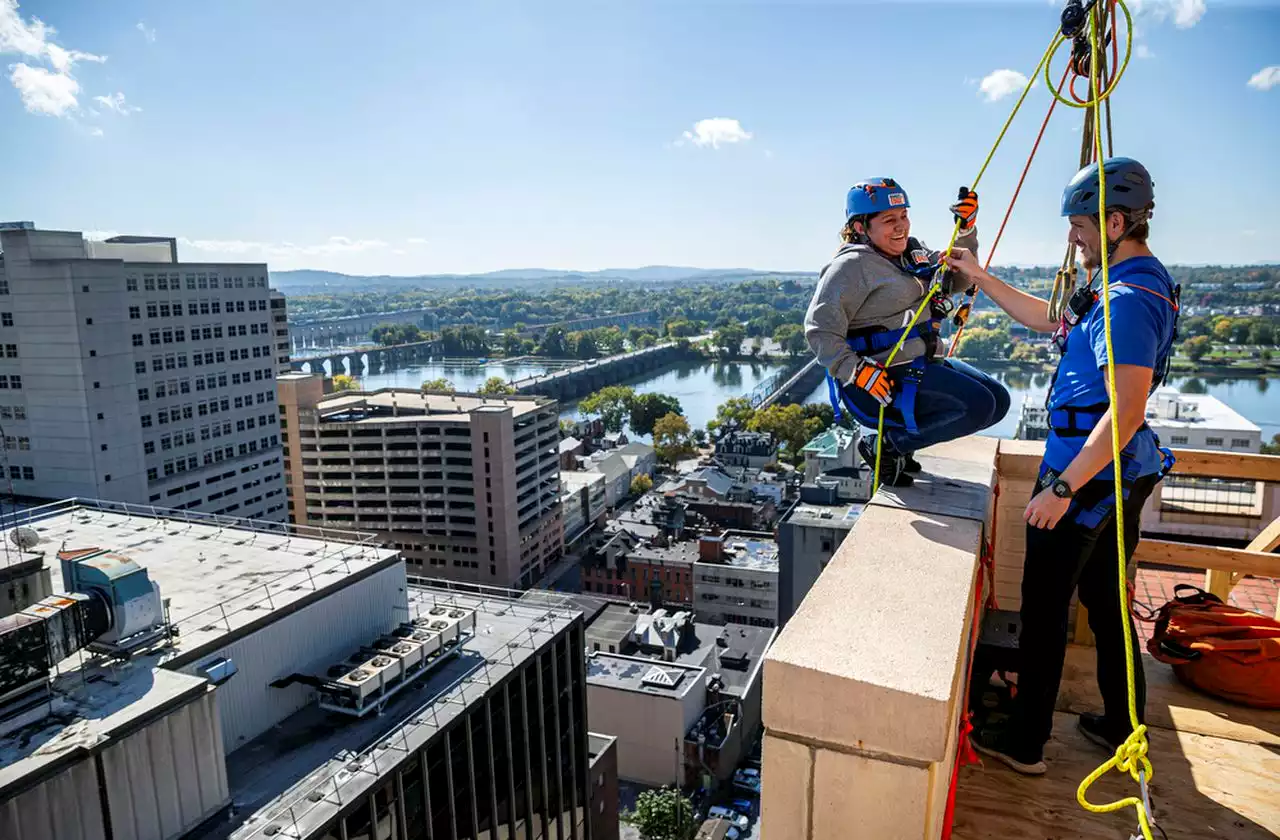 Participants go ‘Over the Edge’ of 21-story building in Harrisburg to benefit charity