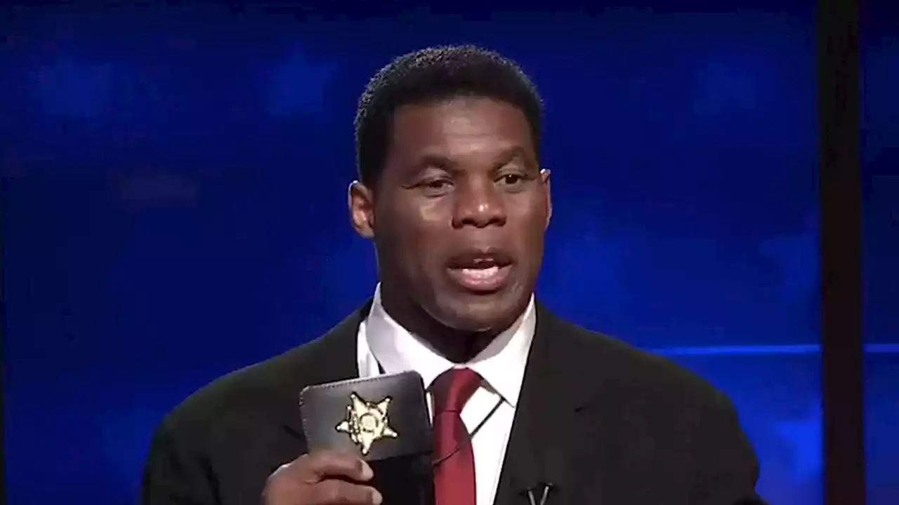 Herschel Walker Flashes Seemingly Bogus Badge at GA Debate