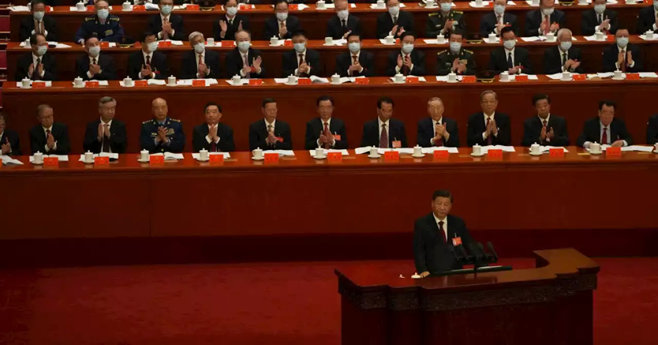 China's Xi calls for military growth as party congress opens