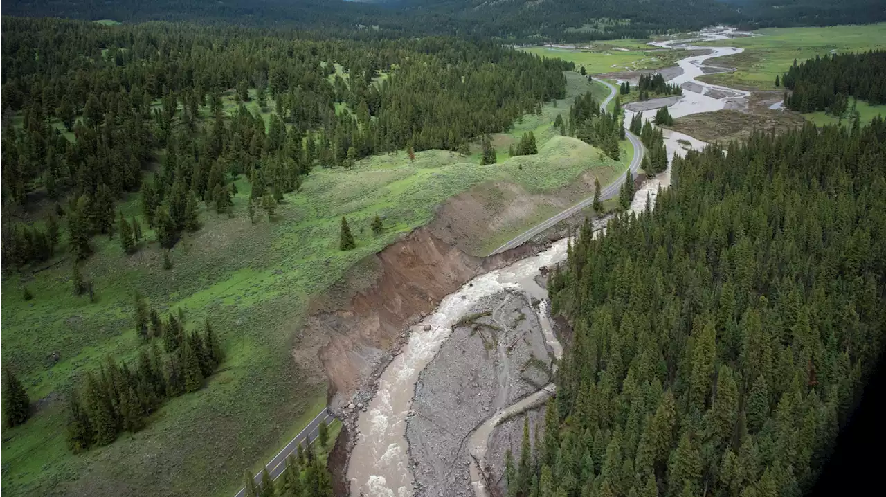 Yellowstone National Park has reopened an entrance devastated by June floods