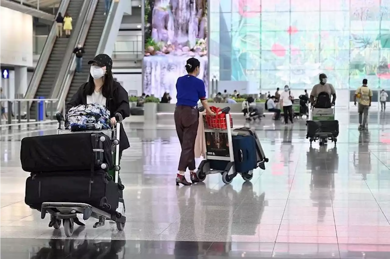 Hong Kong airport traffic surges after hotel quarantine scrapped