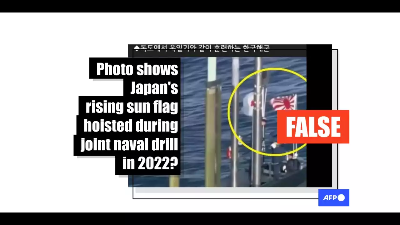 This photo shows Japan's rising sun flag on a submarine from April 2016, not from recent drills