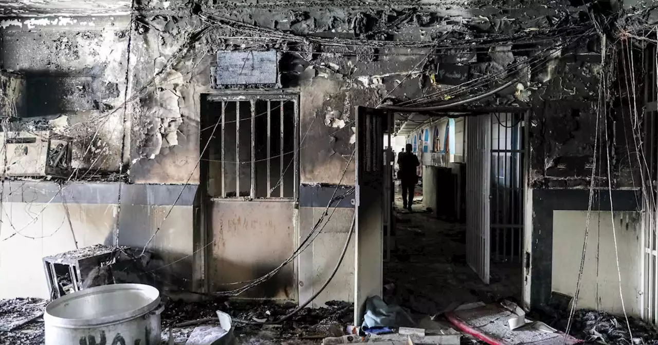 Iranian officials say prison fire killed 4; families of 2 American prisoners say they are safe