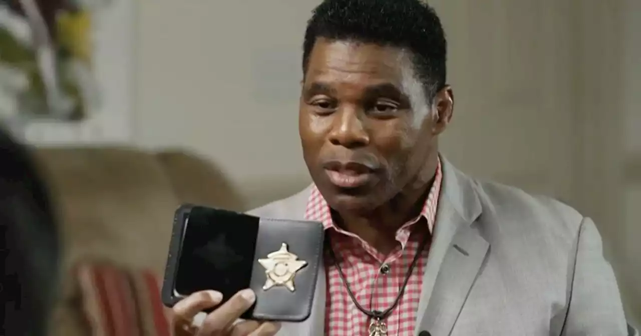 Herschel Walker explains the badge he flashed at Senate debate