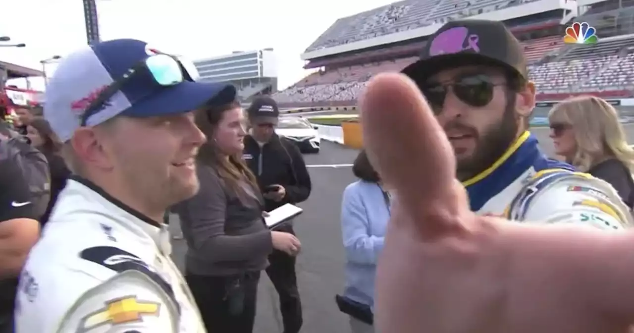 NASCAR Driver Chase Elliott Pushes Photographer Away