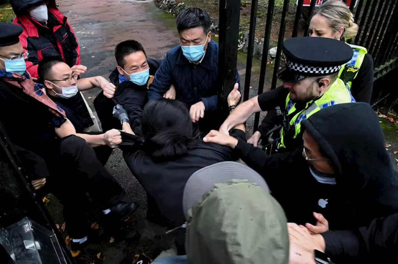 Police investigate beating of protester on China consulate grounds in UK