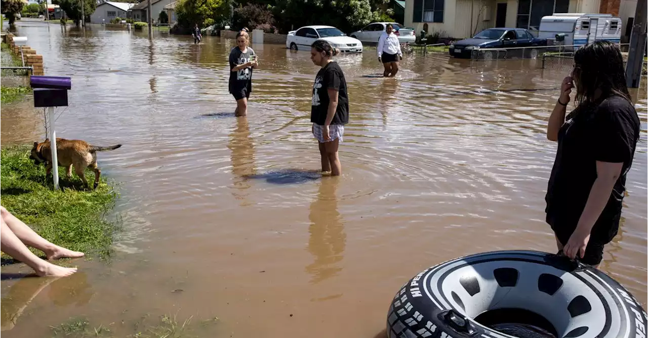 Australians take stock of flood damage amid warnings of more rain