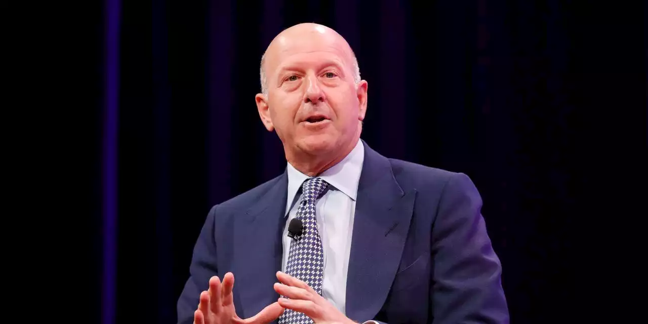 Goldman beats lowered earnings target and unveils plan to reorganize under three business units