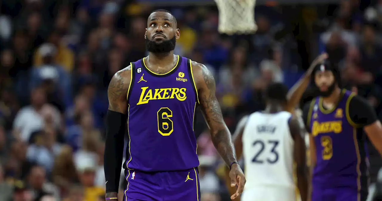 LeBron scores 31 points, Lakers lose to Warriors in season opener