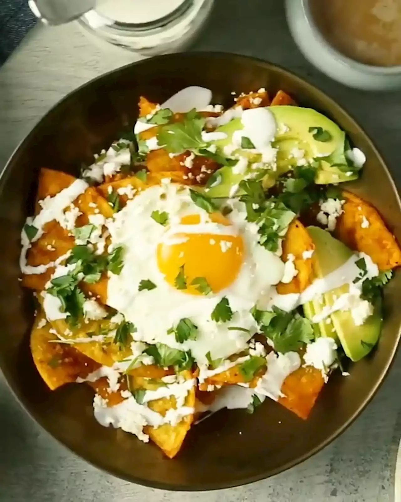 Chilaquiles Rojos with Fried Eggs and Cotija Recipe - Claudette Zepeda