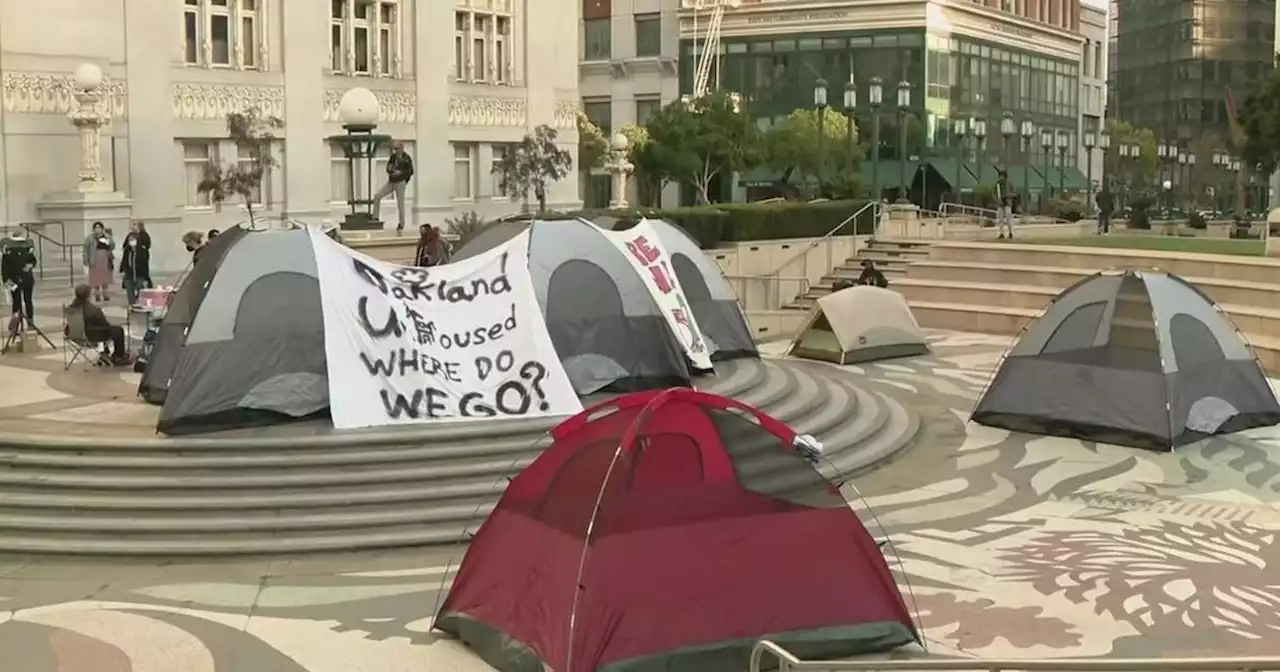 Advocates for homeless forced to leave Wood Street encampment erect tents at Oakland City Hall