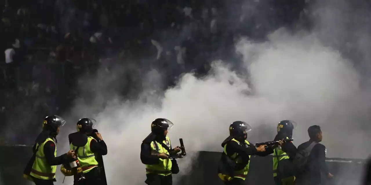 125 die as tear gas triggers crush at Indonesia soccer match