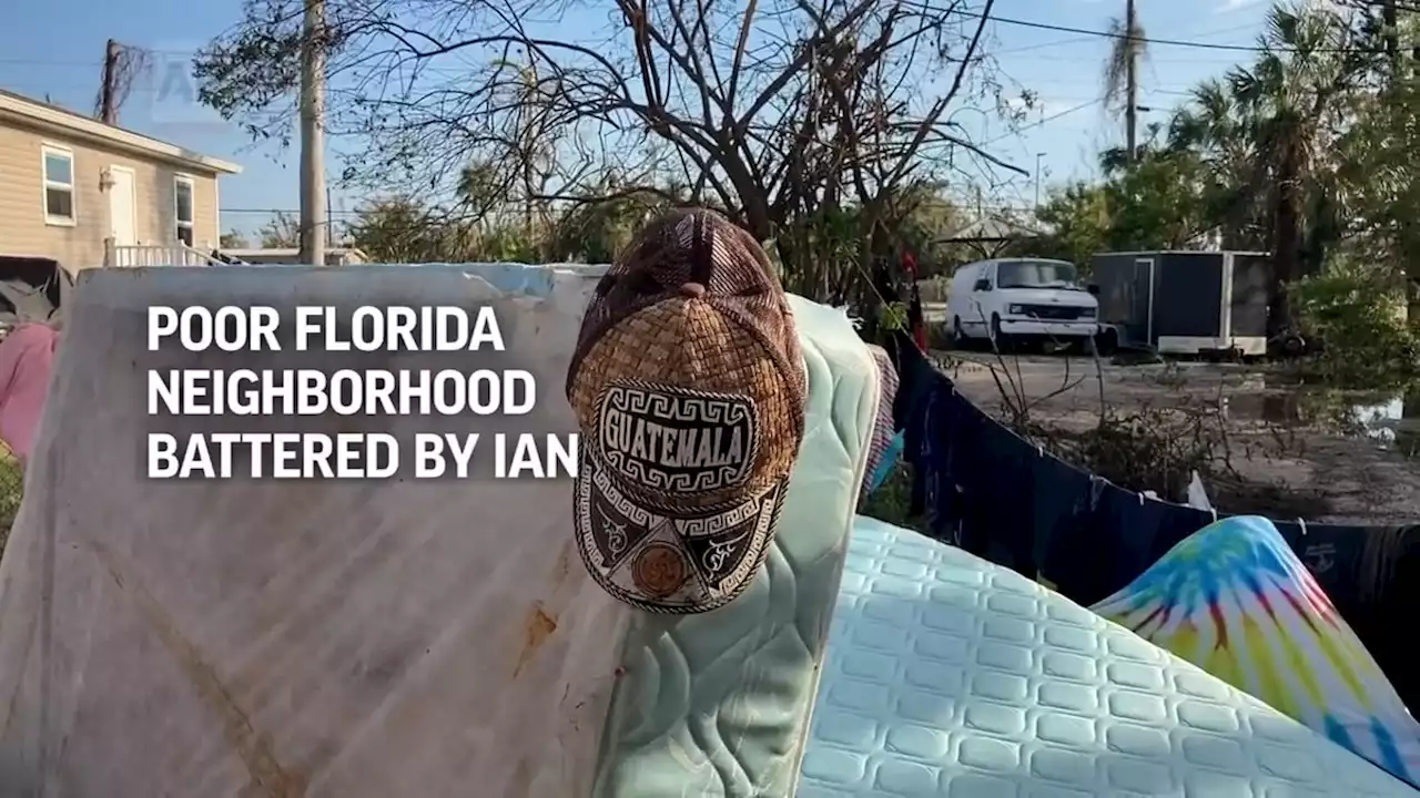 Poor Florida neighborhood battered by flood tries to recover