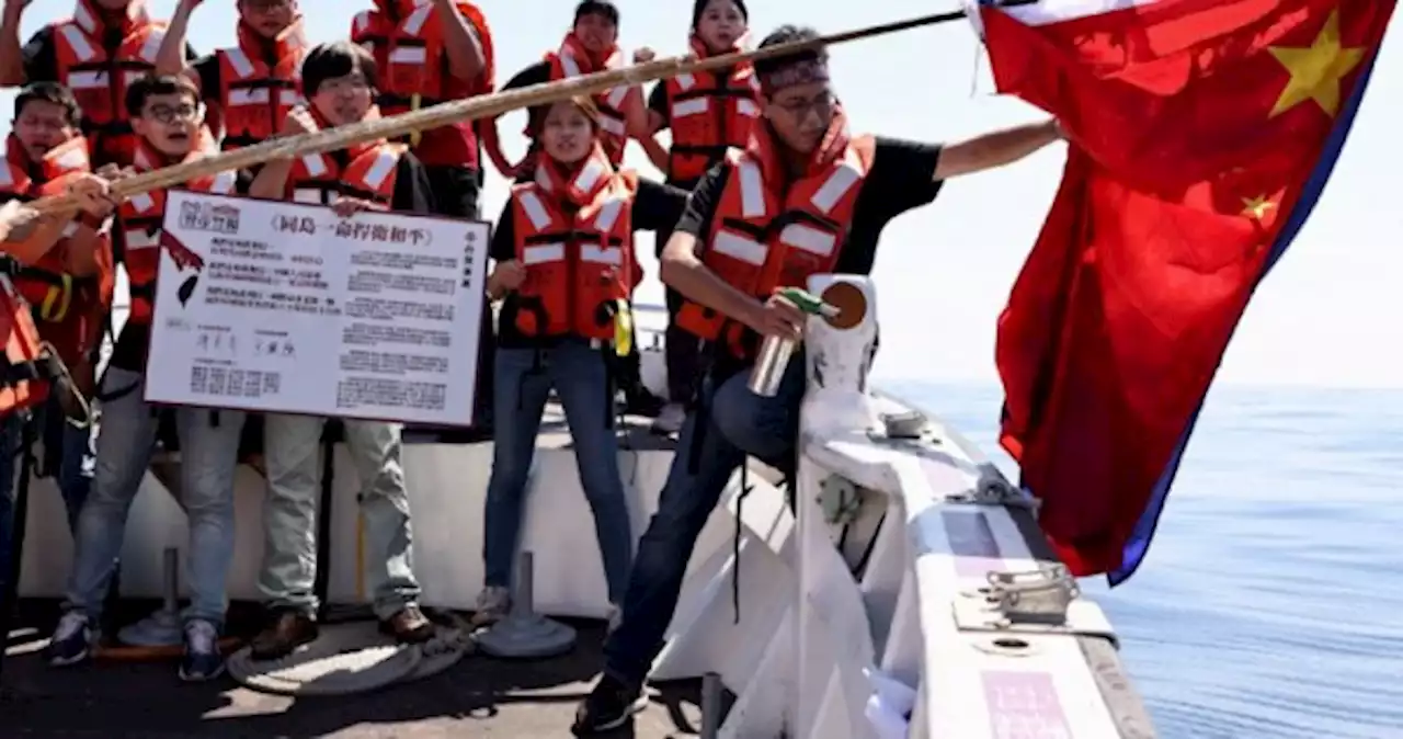 Flag raisings and burnings in Taiwan as some mark China's national day