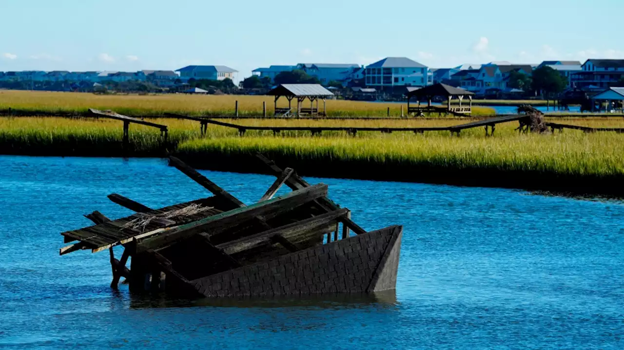 Despite Hurricane Ian's punch, wedding day saved on wet Pawleys Island, S.C.