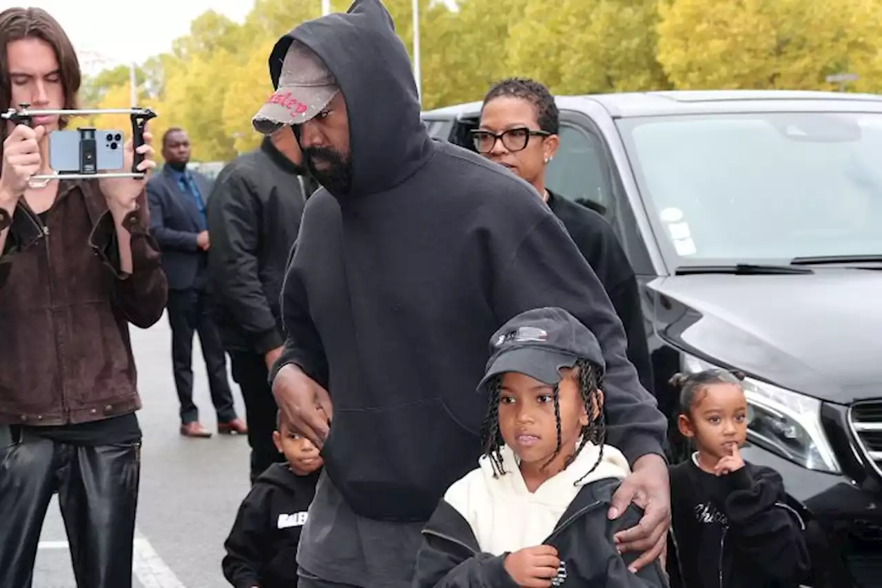 Kanye West Arrives At Balenciaga Fashion Show With Children Ahead Of Walking The Runway