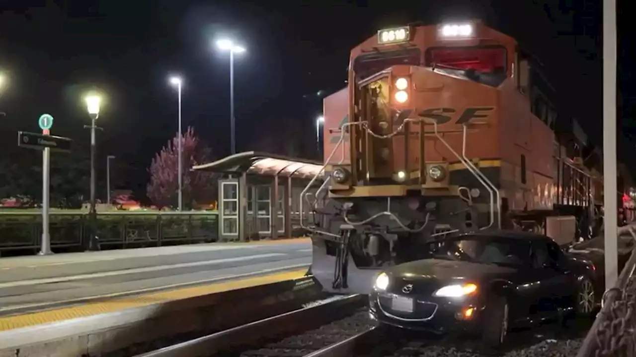 No injuries after car gets stuck on tracks, hit by train in Edmonds