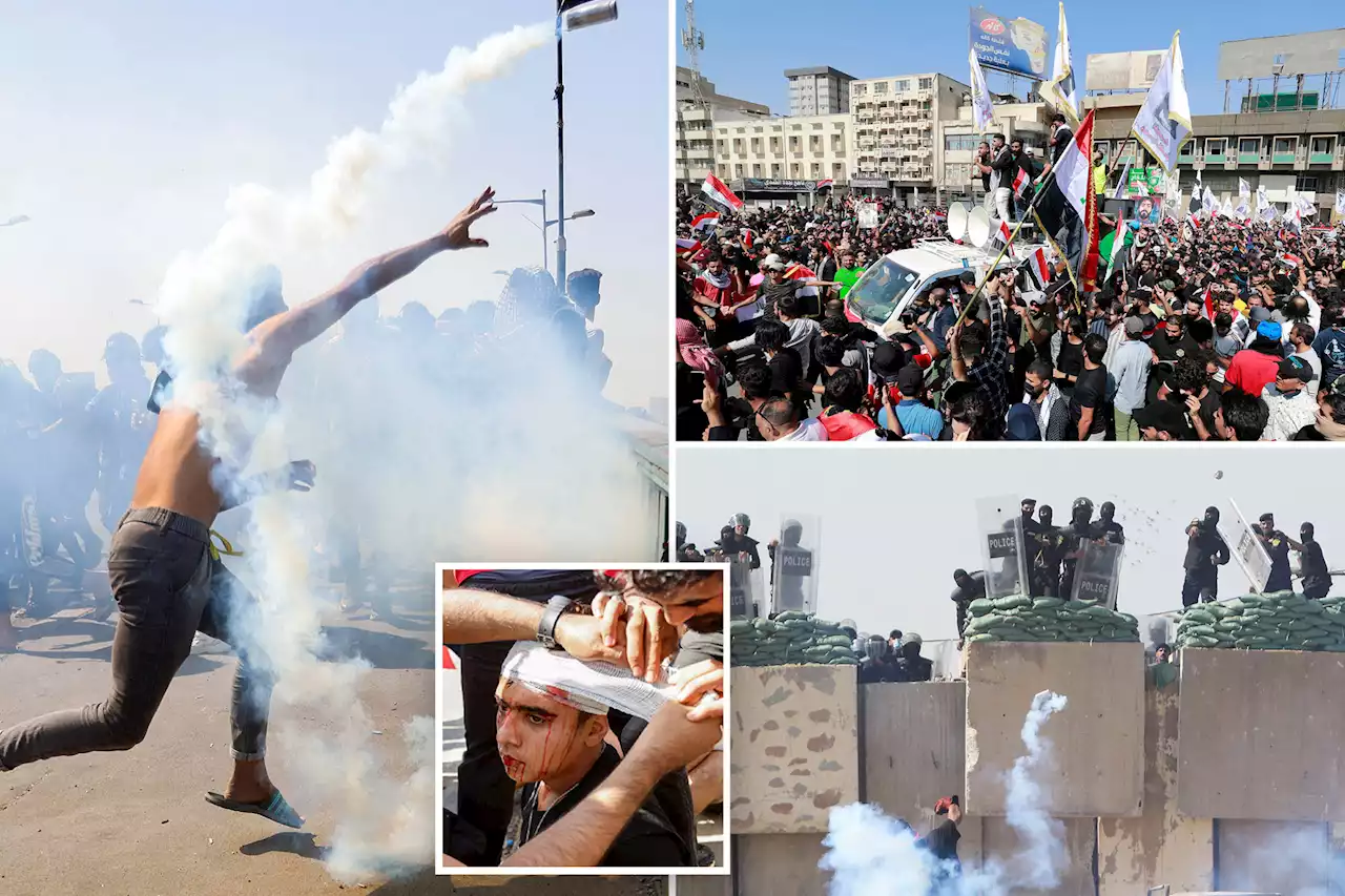 Iraqi protesters engulfed in tear gas during Baghdad demonstration