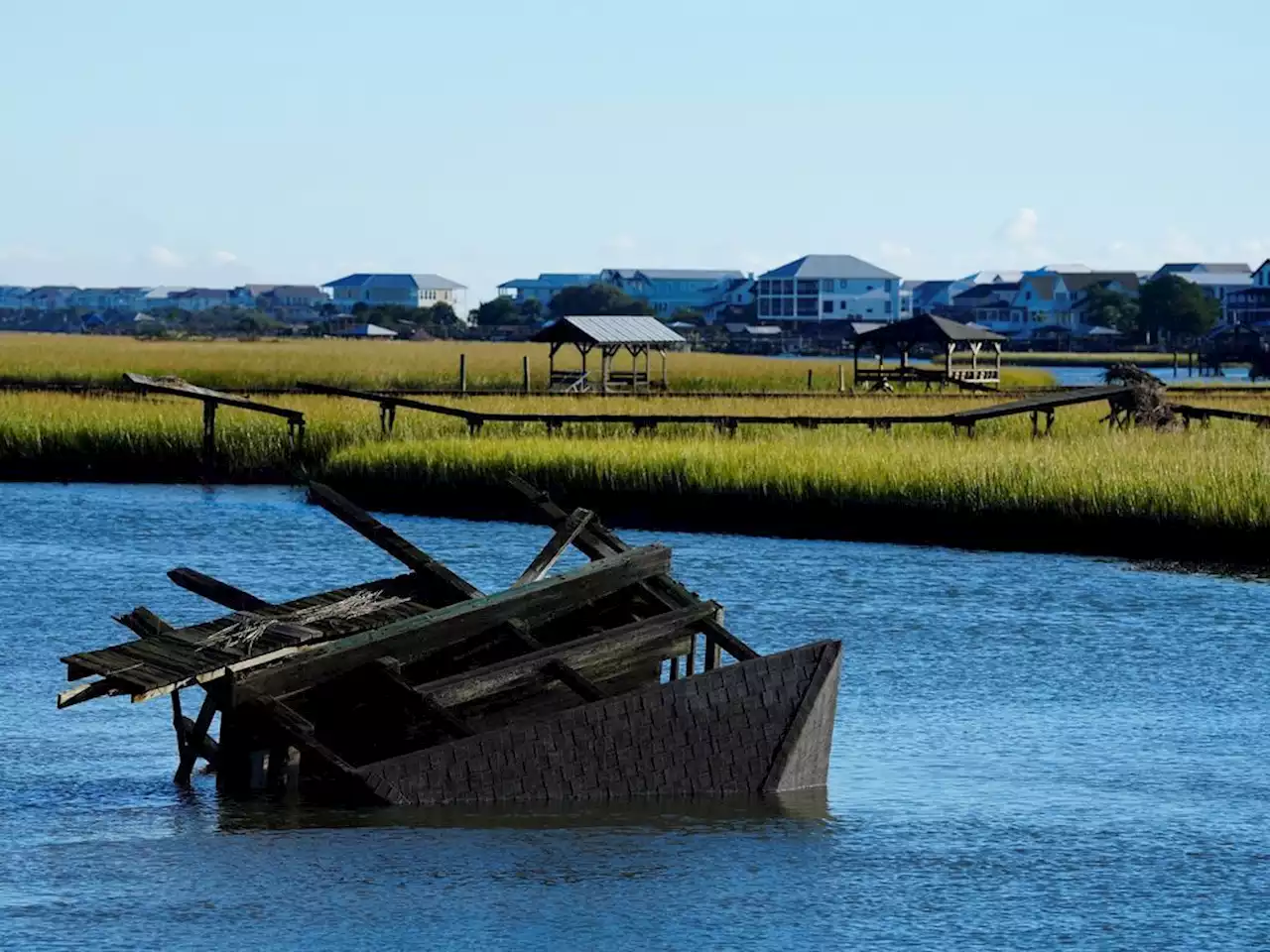 Despite Ian's punch, wedding day saved on wet Pawleys Island