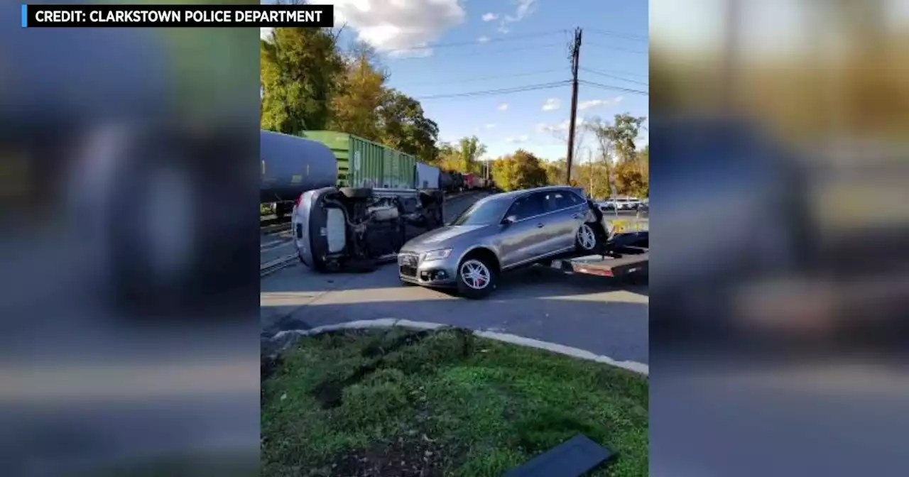 Freight train strikes trailer carrying cars in West Nyack