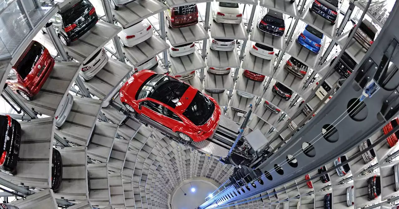 SEE IT: Scientists glue themselves to the floor of a Volkswagen exhibit hall