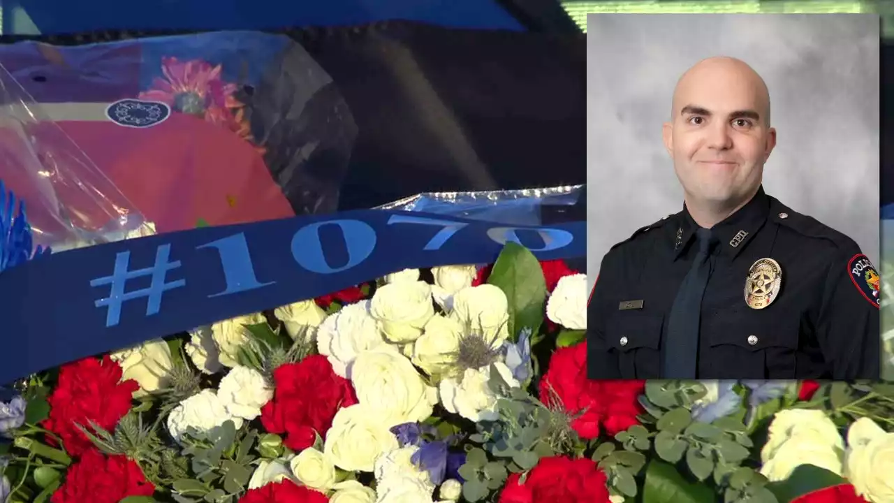 Growing memorial for fallen police officer at Carrollton police headquarters