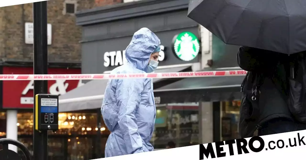 Londoners 'beat man until police arrive' after he 'stabs woman in coffee shop'