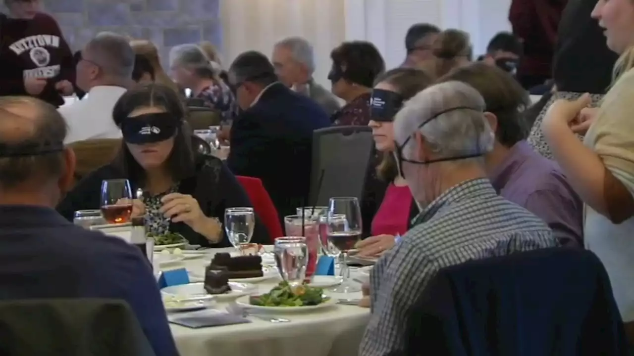 Dozens 'dine in the dark' to benefit visually impaired in Berks County, Pa.