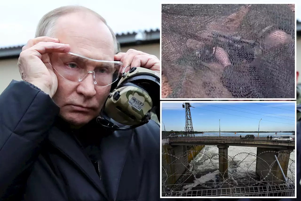 Putin seen firing sniper rifle as Zelensky warns of Russia attack on Kherson dam