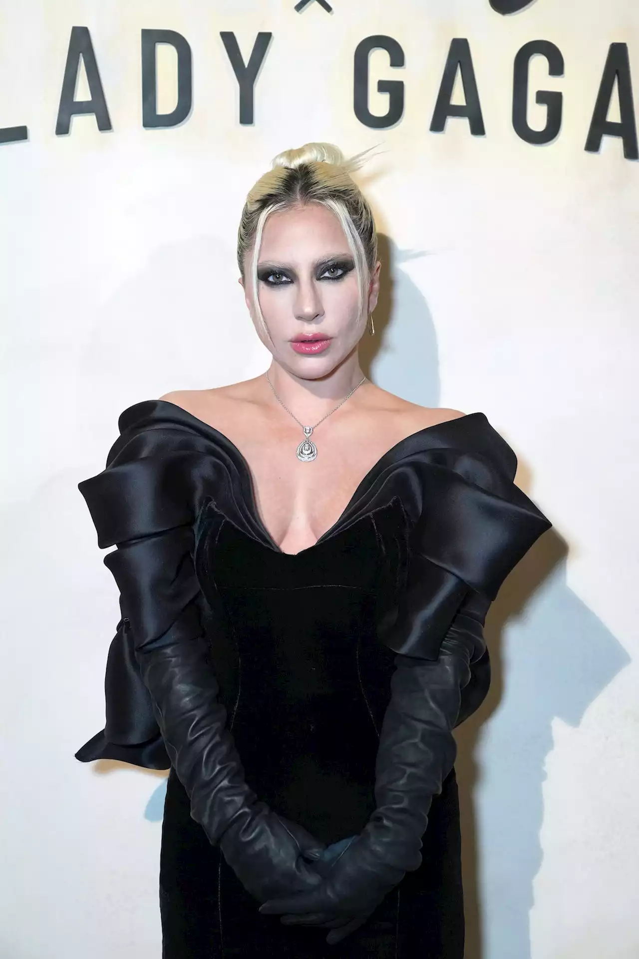 Lady Gaga Wears a Slippery Satin Midi Dress Designed By Her Sister