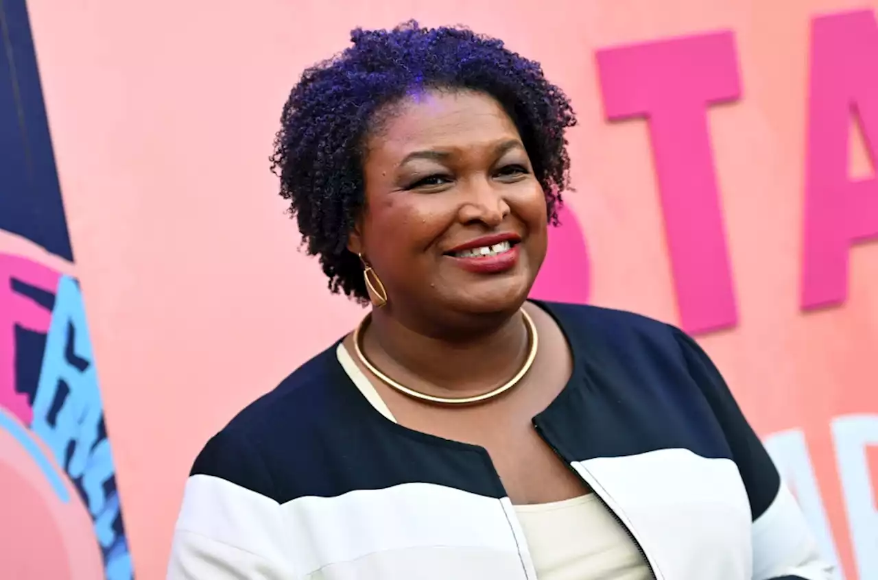 Stacey Abrams Joins Latto on Stage With ‘My Body, My Choice’ Sign in Atlanta